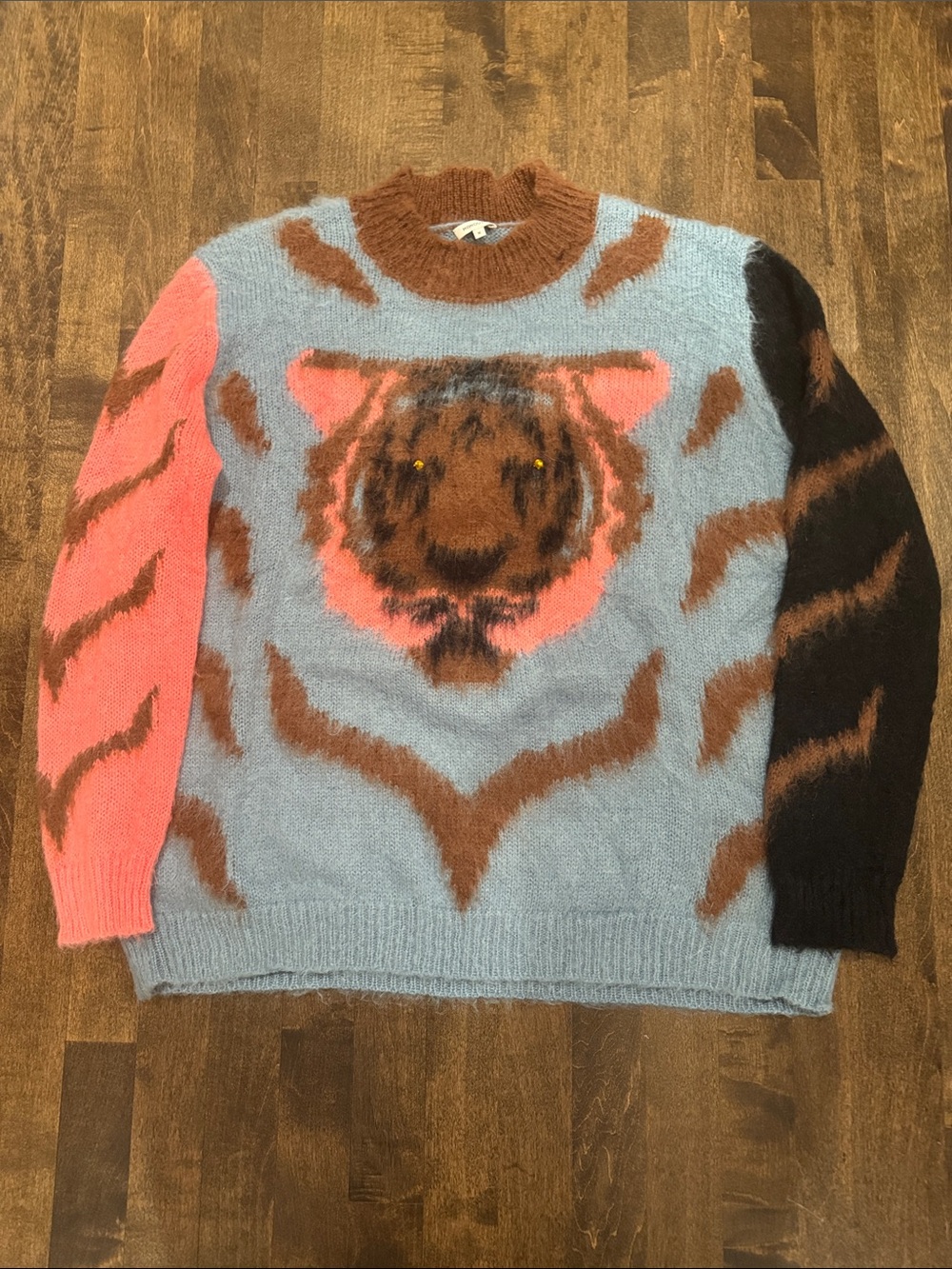 Woman’s  Blue Tiger Intarsia Crewneck Sweater with Peach and Brown Accents.